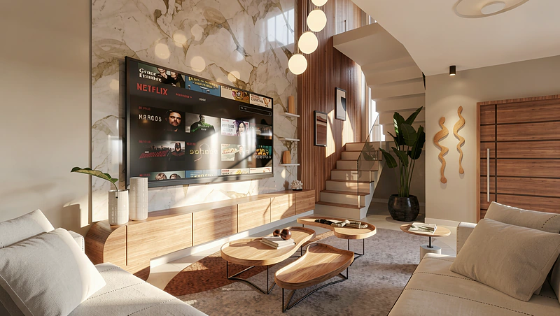 Sala de estar com painel de TV, escada em concreto e pé-direito duplo